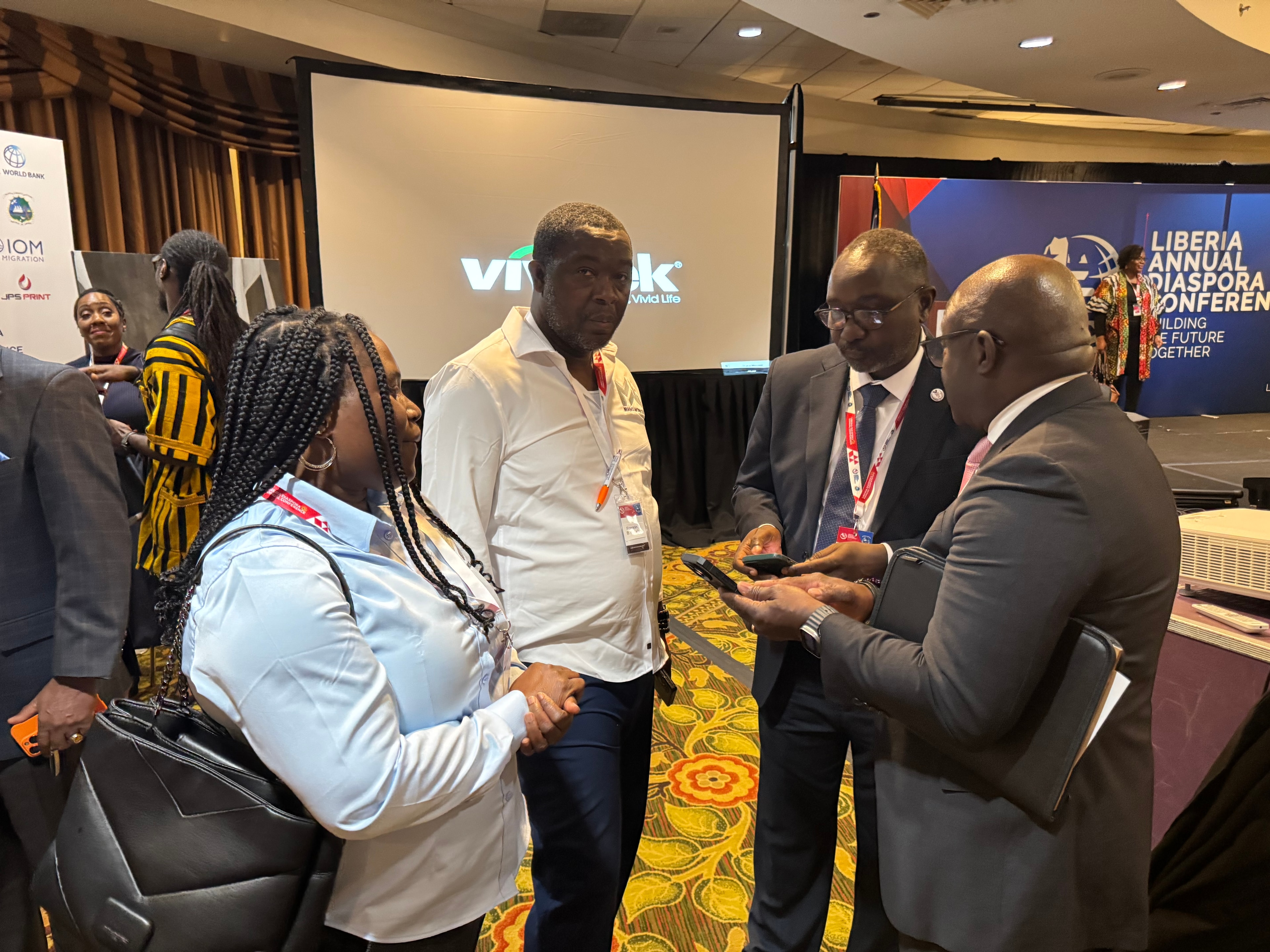 ManoWorks team networking at conference event