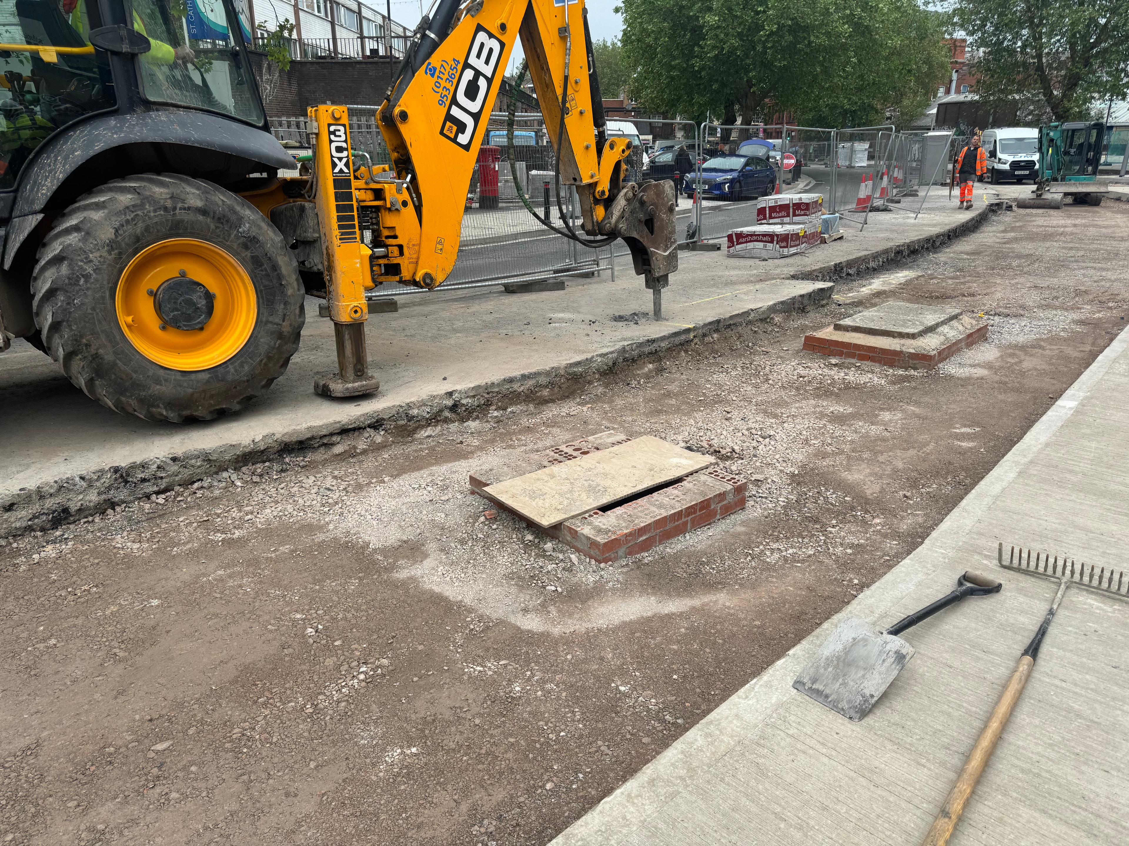 JCB excavator civil engineering groundworks on site